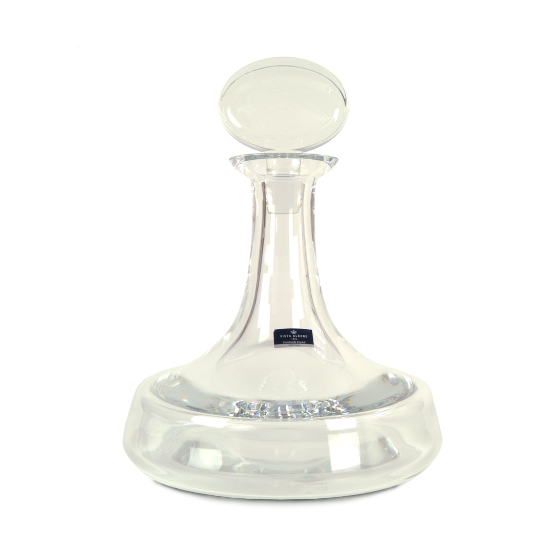 Garrafa Clipper da Vista Alegre em vidro transparente, reinterpretando a histórica garrafa de Vinho do Porto do século XVIII com base larga, pescoço curto e design naval.