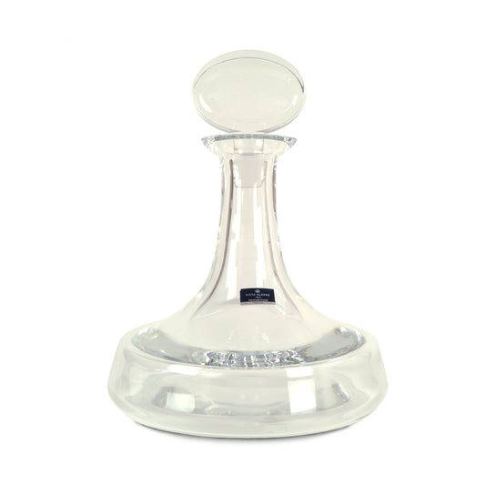 Garrafa Clipper da Vista Alegre em vidro transparente, reinterpretando a histórica garrafa de Vinho do Porto do século XVIII com base larga, pescoço curto e design naval.